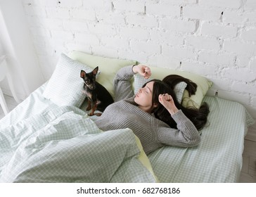 Lonely Girl Wake Up With Dog. Friendship With Small Puppy, Single Woman Morning With Pet