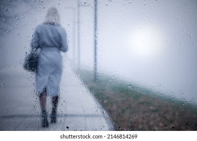 Lonely Girl Walking Down The Street In The Morning Autumn Mist