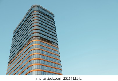 Lonely Glass and Metal Skyscraper Building with Clear Sky background