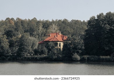 Lonely house on an island in the forest