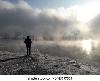 Lonely man in the fog. Siberia. Fog over the Yenisei River. A suburb of Krasnoyarsk. - Shutterstock ID 1445797535