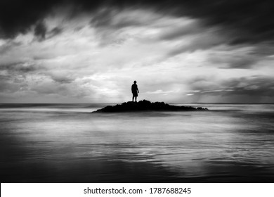 Lonely Man On The Beach Finding Solitude And Peace