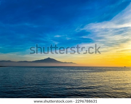 Lonely Mountain, Sea and Sunset