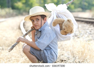 Lonely Orphan Sitting On The Railroad