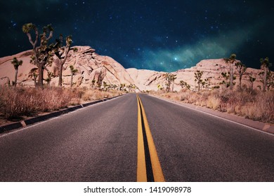 lonely road in the desert on a starry night in California - Powered by Shutterstock