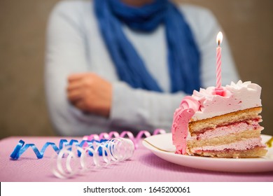 Lonely Sad Woman And Birthday Cake With Burning Candle