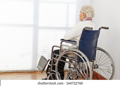 Lonely Senior Citizen Woman In Wheelchair In A Nursing Home