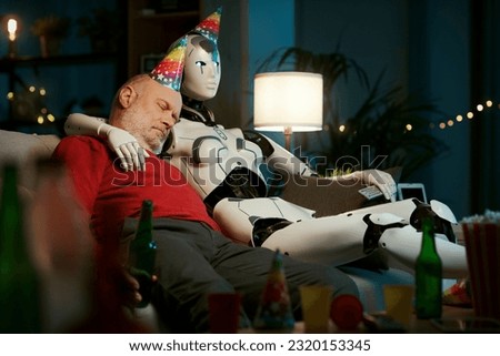 Lonely senior man having a party at home with his humanoid AI robot, he is sleeping and holding a beer, human-robot relationship concept