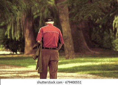 Lonely Senior Walking At Park, Old Man Got Lost