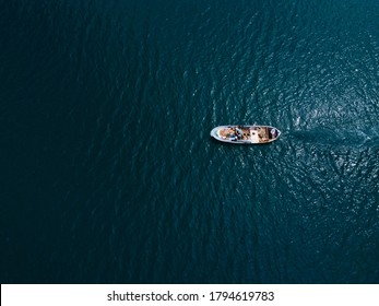 Lonely Small Fishing Boat In The Sea, Shot In The Air