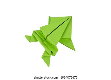 A lonely small hand made origami paper frog isolated on a clean paper background - Powered by Shutterstock