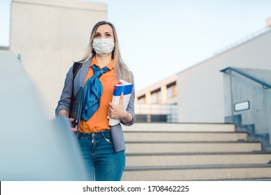 Lonely Student On College Campus Closed Due To Covid-19 Walking Down Stairs