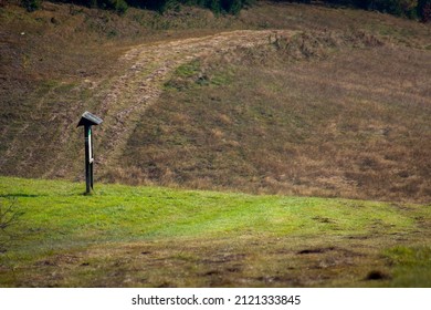 Lonely Tourist Information Board in Beskids Mountains near Jaworzyna Krynicka summit, Poland. - Shutterstock ID 2121333845