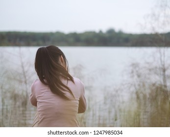 Lonely Woman Sitting Alone Beside River Stock Photo (Edit Now) 1247985034