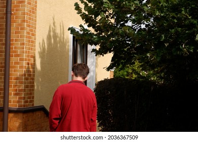 Lonely Young Guy Walking Around The House