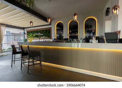 Long Bar Counter In Empty Hotel Cafe Bar