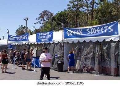 Long Beach, CA - September 4 2021: People visiting the food stands at the Greek Festival in Long Beach CA.  