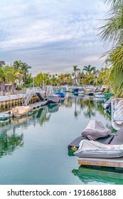 Long Beach California Landscape With Canal And Waterfront Homes Under Cloudy Sky