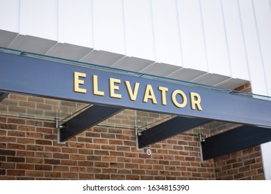 Long Beach, California, United States - 01-22-2020: A closeup of a sign letting guests know where the local elevator is located.