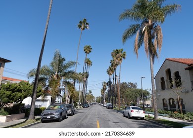 Long Beach, California USA - April 01, 2021: Suburban Neighborhood With Parked Cars On The Road