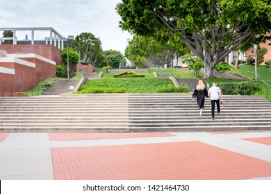 Long Beach, California/United States - 05/23/2019: A Couple Walks Up The Staircase At California State University Long Beach