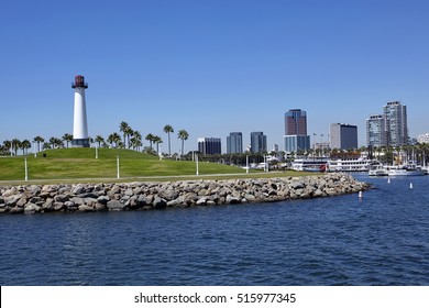 Long Beach Lighthouse, Harbour, Skyline And Marina In Long Beach With Palm Trees, California At Sunrise