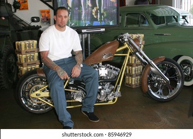LONG BEACH - MAY 7: Jesse James poses on a motorcycle before he signs advance copies of his book 'I Am Jesse James' on May 7, 2004 at his West Coast Choppers Showroom in Long Beach, California