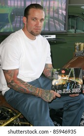 LONG BEACH - MAY 7: Jesse James signs advance copies of his book 'I Am Jesse James' on May 7, 2004 at his West Coast Choppers Showroom in Long Beach, California