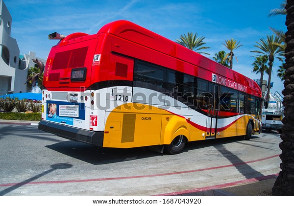 Long beach transit public bus\
in red and yellow colors. Long beach, California. March 27,\
2020