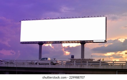 Long Blank Advertising Billboard At Twilight