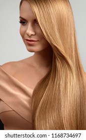 Long Blonde Hair. Beautiful Woman With Healthy Straight Hair