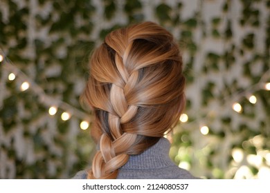 Long Blonde Hair In A French Braid Hairstyle