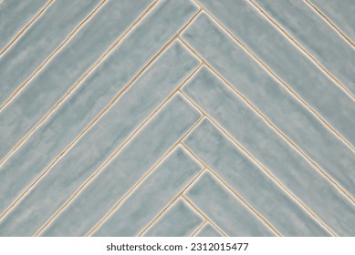 Long blue gray tile pattern with light glaze finish, diagonal pattern on a wall, background image. Color swatch design sample.  - Shutterstock ID 2312015477