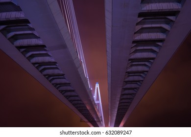 Long bridge at night. perspective view. urban landscape