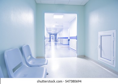 long corridor in hospital with chairs - Shutterstock ID 547380694