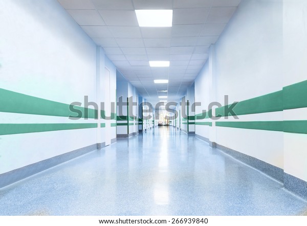 long\
corridor in hospital with doors and\
reflections