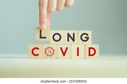 Long Covid, Post Covid Concept. Long-term Effects Of Coronavirus. Chronic Fatigue Or Weakness, Feeling Tired Easily. Medical, Treatment For Long Covid Symstoms, Tips For Recovery.
Wooden Cube Blocks.