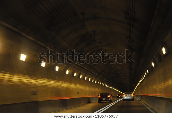 long dark road\
tunnel