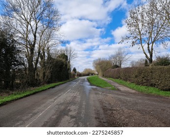 Long deserted country lane example - Shutterstock ID 2275245857