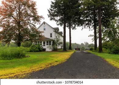 Long Driveway To Large Rural American Home