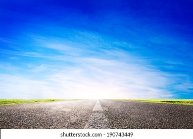 Long Empty Asphalt Road, Highway Towards Sun. Travel, Transport Concepts