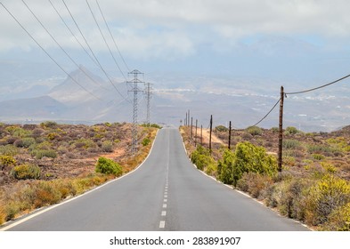 Long Empty Desert Asphalt Road in Canary Islands Spain