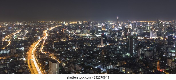 Long exposure of Bangkok at nighttime from Lebua state tower. Highway motion blur.
