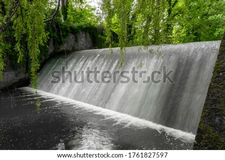 Long exposure of the big waterfall on The River Sid in Sidmouth