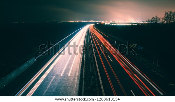 Long exposure car\
lights at the highway