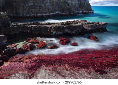 Long Exposure of a Colourful Rocky Shore on a Sunny Day, Devils Kitchen, Noosa National Park, Noosa Heads, Sunshine Coast, Queensland, Australia