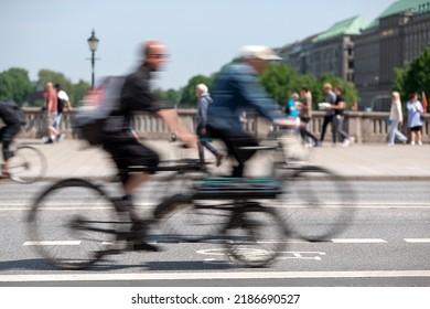 long exposure of cyclists on a bike lane