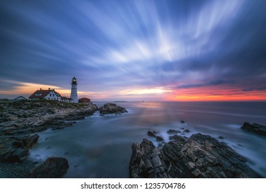 Long exposure of dark clouds passing over Portland Head Lighthouse at Cape Elizabeth, Maine 