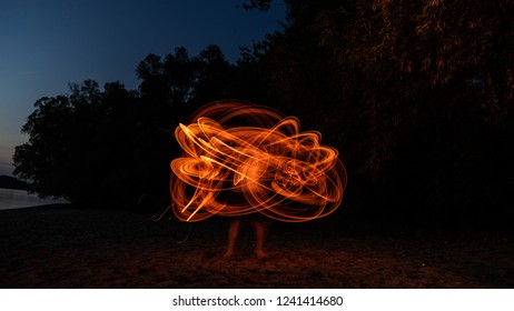 Long exposure fire art - Powered by Shutterstock