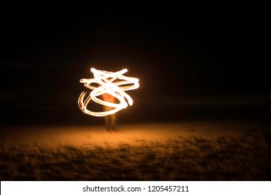 Long Exposure Of Fire Dancing